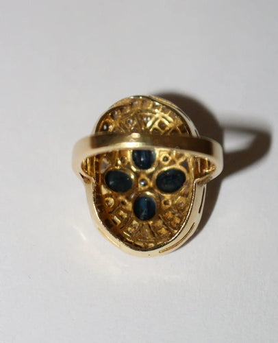 Bague 52 Bague ovale en or jaune 18 carats, saphirs et diamants 58 Facettes 587