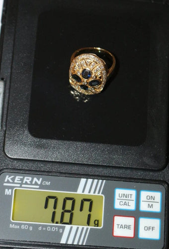 Bague 52 Bague ovale en or jaune 18 carats, saphirs et diamants 58 Facettes 587