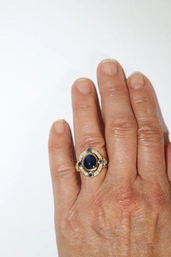 Bague 51.5 Bague en or jaune 18 carats saphir cabochon et diamants 58 Facettes 589