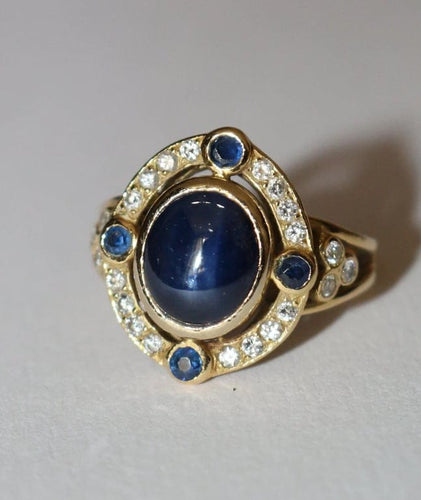 Bague 51.5 Bague en or jaune 18 carats saphir cabochon et diamants 58 Facettes 589