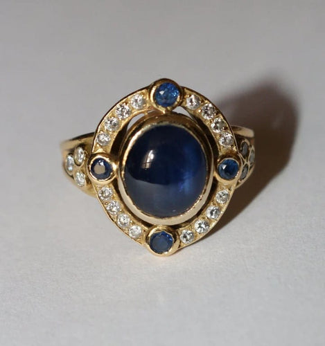 Bague 51.5 Bague en or jaune 18 carats saphir cabochon et diamants 58 Facettes 589