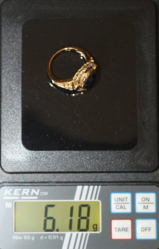 Bague 51.5 Bague en or jaune 18 carats saphir cabochon et diamants 58 Facettes 589