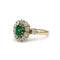 Bague 50 Bague marguerite - Or jaune 750‰, platine 950‰, diamants et émeraude 58 Facettes 1058