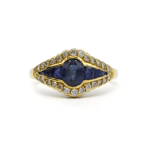 Bague 56 Bague en or jaune 750‰ avec saphirs et diamants 58 Facettes 1028