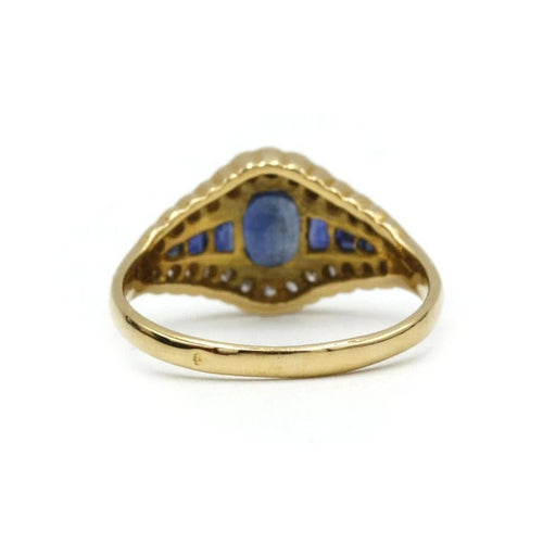 Bague 56 Bague en or jaune 750‰ avec saphirs et diamants 58 Facettes 1028