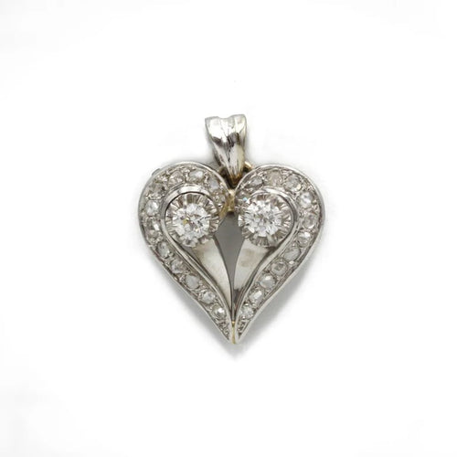 Pendentif Pendentif cœur en or blanc et diamants 58 Facettes 1129