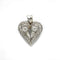 Pendentif Pendentif cœur en or blanc et diamants 58 Facettes 1129
