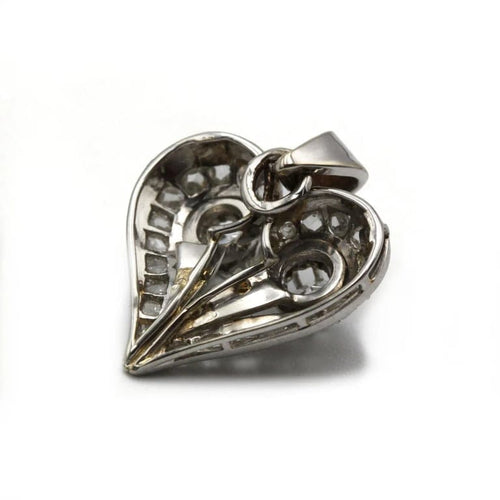 Pendentif Pendentif cœur en or blanc et diamants 58 Facettes 1129