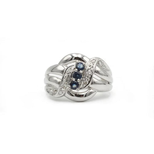 Bague 54 Bague en or blanc 750‰ avec saphirs et diamants 58 Facettes 1143
