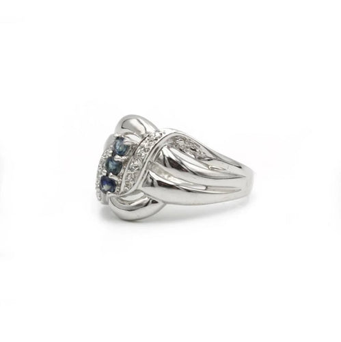 Bague 54 Bague en or blanc 750‰ avec saphirs et diamants 58 Facettes 1143