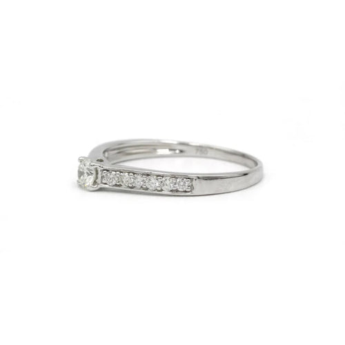 Bague 57 Bague solitaire en or blanc 750‰ et diamants 58 Facettes 1148