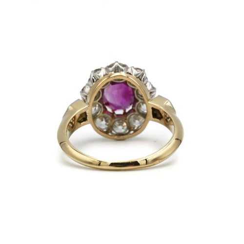 Bague 52 Bague marguerite ancienne en or 750 et platine, rubis birman et diamants 58 Facettes 1322