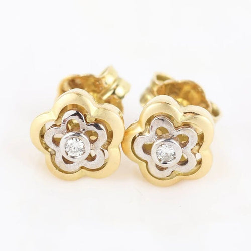 Boucles d'oreilles Boucles d'oreilles fleur en or jaune et blanc 18 carats et diamants 58 Facettes 131208