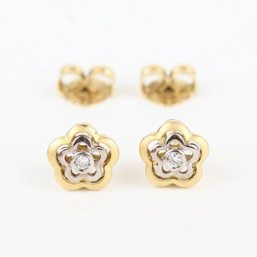 Boucles d'oreilles Boucles d'oreilles fleur en or jaune et blanc 18 carats et diamants 58 Facettes 131208