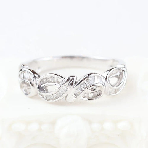 Bague 60 Bague en or blanc 18 carats sertie de diamants trapèze 0,69 ct 58 Facettes 133710C