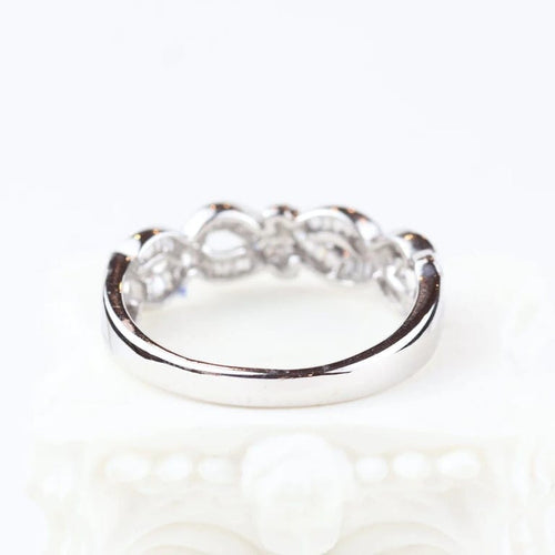 Bague 60 Bague en or blanc 18 carats sertie de diamants trapèze 0,69 ct 58 Facettes 133710C