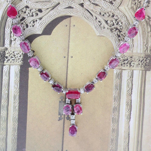 Collier Collier ras-de-cou haute joaillerie en or blanc 18 carats, rubis et diamants 58 Facettes