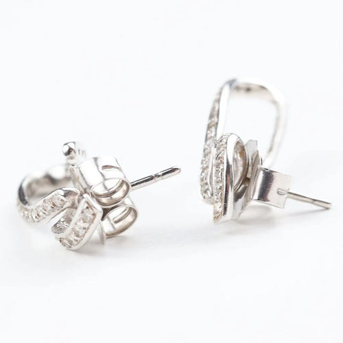 Boucles d'oreilles Boucles d'oreilles en or blanc 18 carats et diamants taille brillant 58 Facettes 131366F