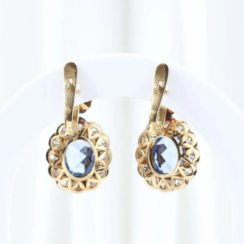 Boucles d'oreilles Boucles d'oreilles vintage à motif floral en or jaune 18 carats et diamants 58 Facettes J00003070