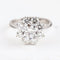 Bague 52 Bague rosette en or blanc 18 carats avec diamants 58 Facettes 136043