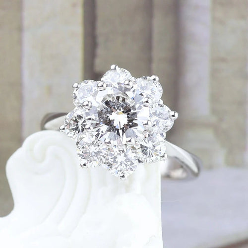 Bague 52 Bague rosette en or blanc 18 carats avec diamants 58 Facettes 136043