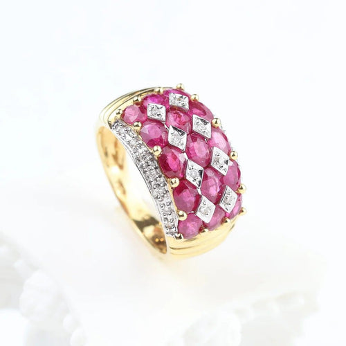 Bague 52 Bague en or jaune 18 carats rubis ovales et diamants 58 Facettes 132984