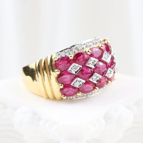 Bague 52 Bague en or jaune 18 carats rubis ovales et diamants 58 Facettes 132984