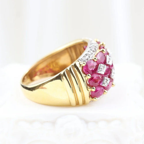 Bague 52 Bague en or jaune 18 carats rubis ovales et diamants 58 Facettes 132984