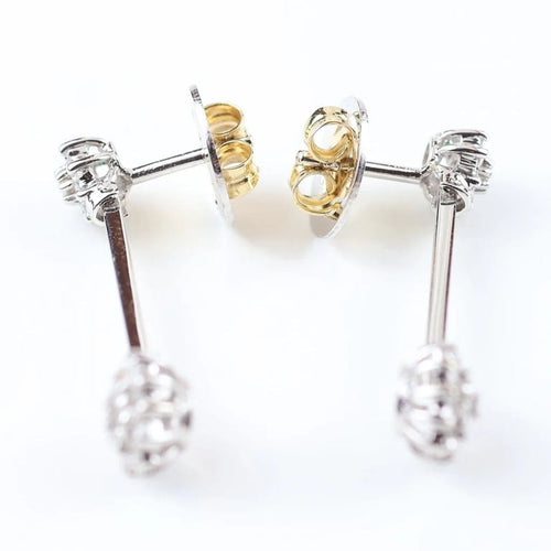 Boucles d'oreilles Boucles d'oreilles longues à rosettes en or blanc 18 carats et diamants 58 Facettes VV1-F