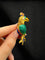 Broche Broche perroquet précieux en or jaune et émail 58 Facettes