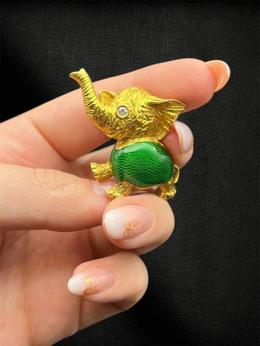 Broche Broche « Dumbo » éléphant en émaux verts et diamant 58 Facettes