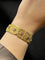 Bracelet Bracelet « Broderie féerique » en filigrane d’or avec saphirs et rubis 58 Facettes