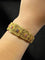 Bracelet Bracelet « Broderie féerique » en filigrane d’or avec saphirs et rubis 58 Facettes