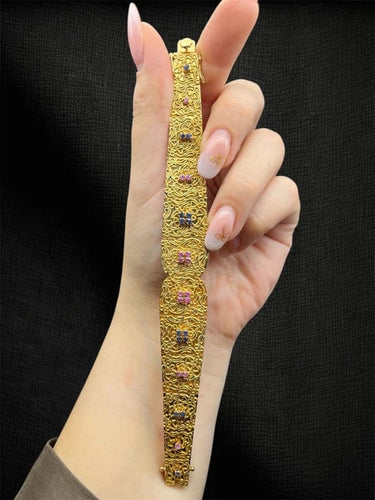 Bracelet Bracelet « Broderie féerique » en filigrane d’or avec saphirs et rubis 58 Facettes
