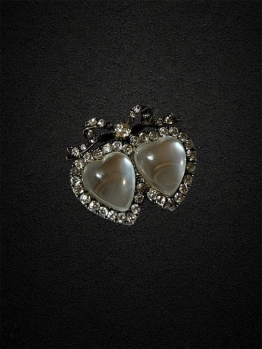 Broche Broche « L’Élégance de l’Amour » en or, diamants et pierres de lune 58 Facettes