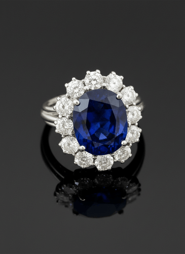 Bague 52 Cœur de l’Océan - Bague marguerite en or blanc 750, saphir et diamants 58 Facettes