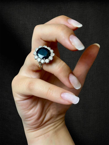 Bague 52 Cœur de l’Océan - Bague marguerite en or blanc 750, saphir et diamants 58 Facettes