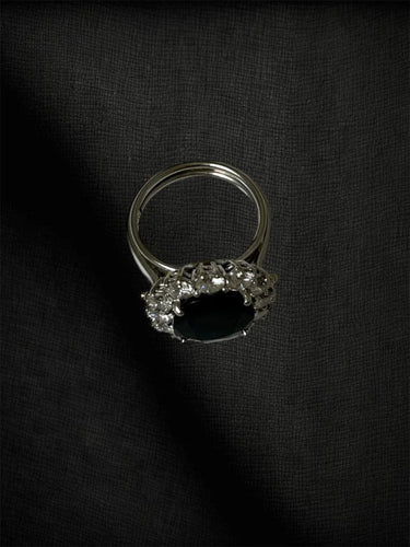 Bague 52 Cœur de l’Océan - Bague marguerite en or blanc 750, saphir et diamants 58 Facettes