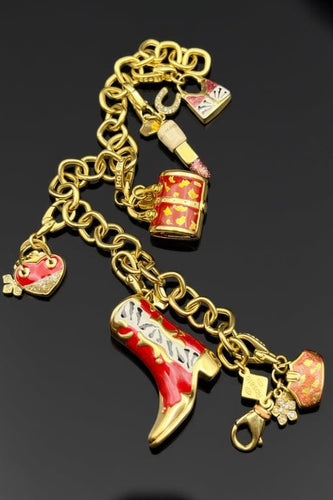 Bracelet Pretty Woman - Bracelet à breloques en or jaune 58 Facettes