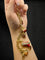 Bracelet Pretty Woman - Bracelet à breloques en or jaune 58 Facettes