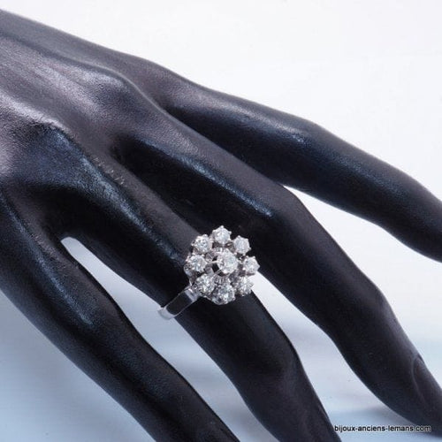 Bague 50 Bague marguerite en or blanc 18 carats et diamants 58 Facettes 4196