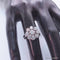 Bague 50 Bague marguerite en or blanc 18 carats et diamants 58 Facettes 4196
