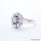Bague 50 Bague marguerite en or blanc 18 carats et diamants 58 Facettes 4196