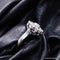 Bague 50 Bague marguerite en or blanc 18 carats et diamants 58 Facettes 4196