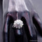 Bague 56 Bague marguerite Art déco en or 18 carats et platine, diamants 58 Facettes 4072
