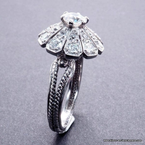 Bague 56 Bague marguerite Art déco en or blanc et platine, diamants 58 Facettes 4072