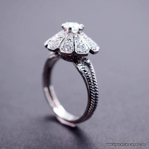 Bague 56 Bague marguerite Art déco en or blanc et platine, diamants 58 Facettes 4072