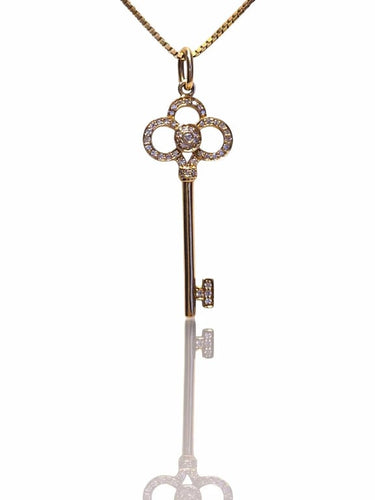 Collier Tiffany & Co - Collier avec pendentif clé en or jaune 18 carats et diamants 58 Facettes 11114