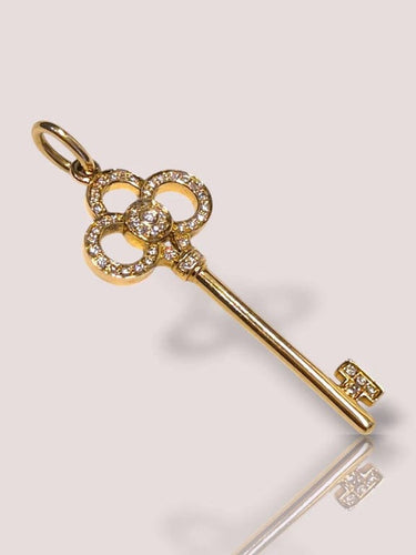 Collier Tiffany & Co - Collier avec pendentif clé en or jaune 18 carats et diamants 58 Facettes 11114