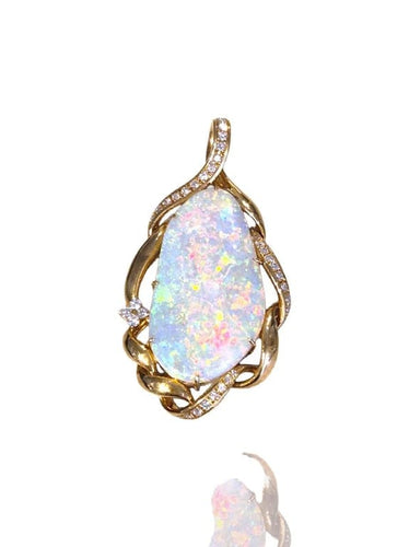 Pendentif Pendentif vintage en or jaune 18 carats avec opale et diamants 58 Facettes 60023898